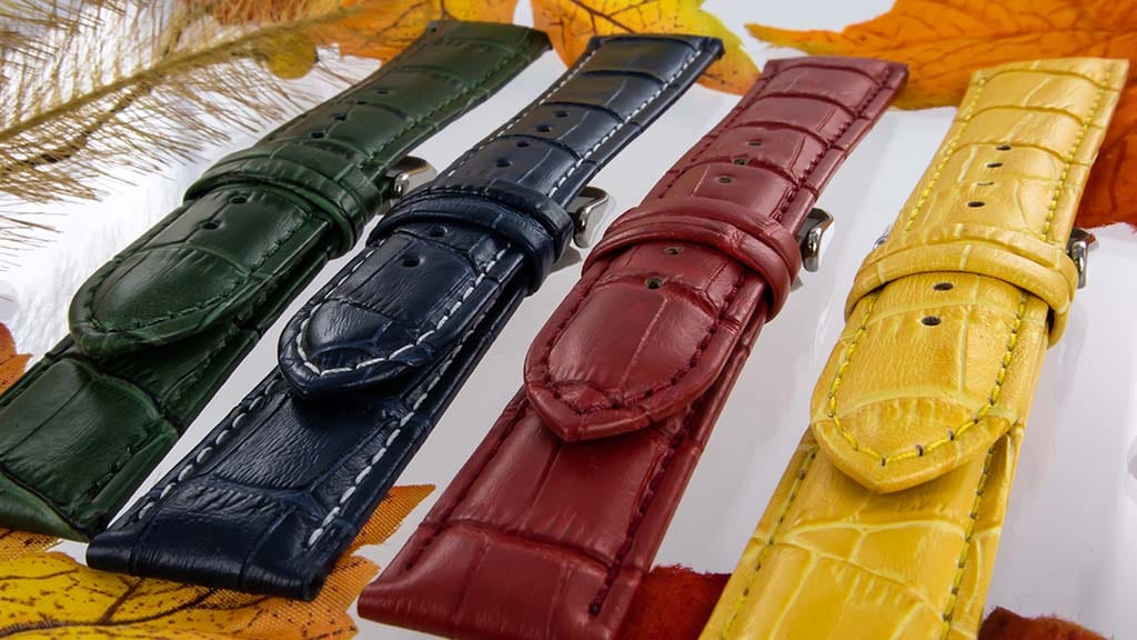 Hoge kwaliteit leren horlogebanden in groen, blauw, rood en geel.